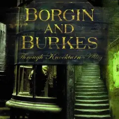 Mroczna uliczka z napisem "Borgin and Burkes" i schodami. Po lewej Draco Malfoy, po prawej Harry Potter.